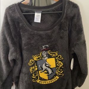 Cute HufflePuff sweater! Extremely soft! Its never been worn, original tags $15